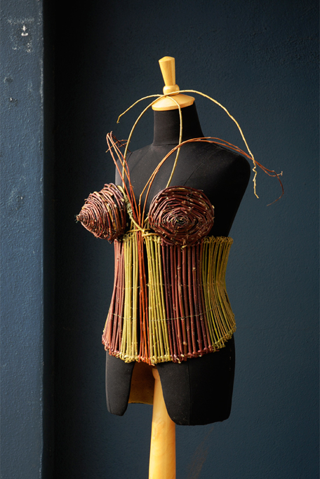 The bustier is woven from Wild Red Rose branches, with thorns intact and various Willow and Dogwood branches.