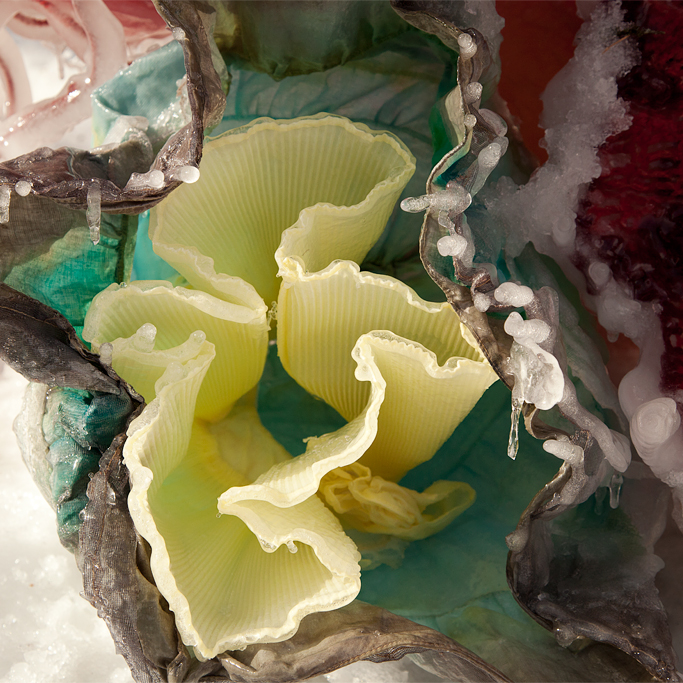 Layers of skirts create layers of petals.